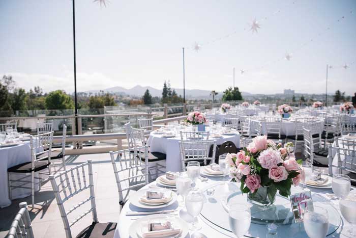 A micro wedding reception set-up in white and pink at The Centre in Escondido