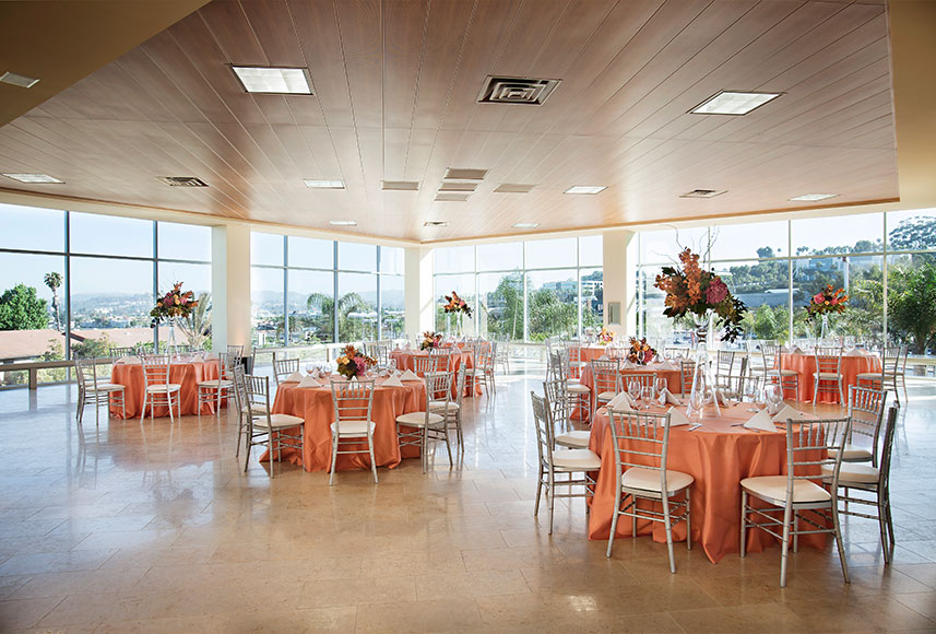 Indoor corporate event venue with floor to ceiling windows overlooking Escondido's mountains