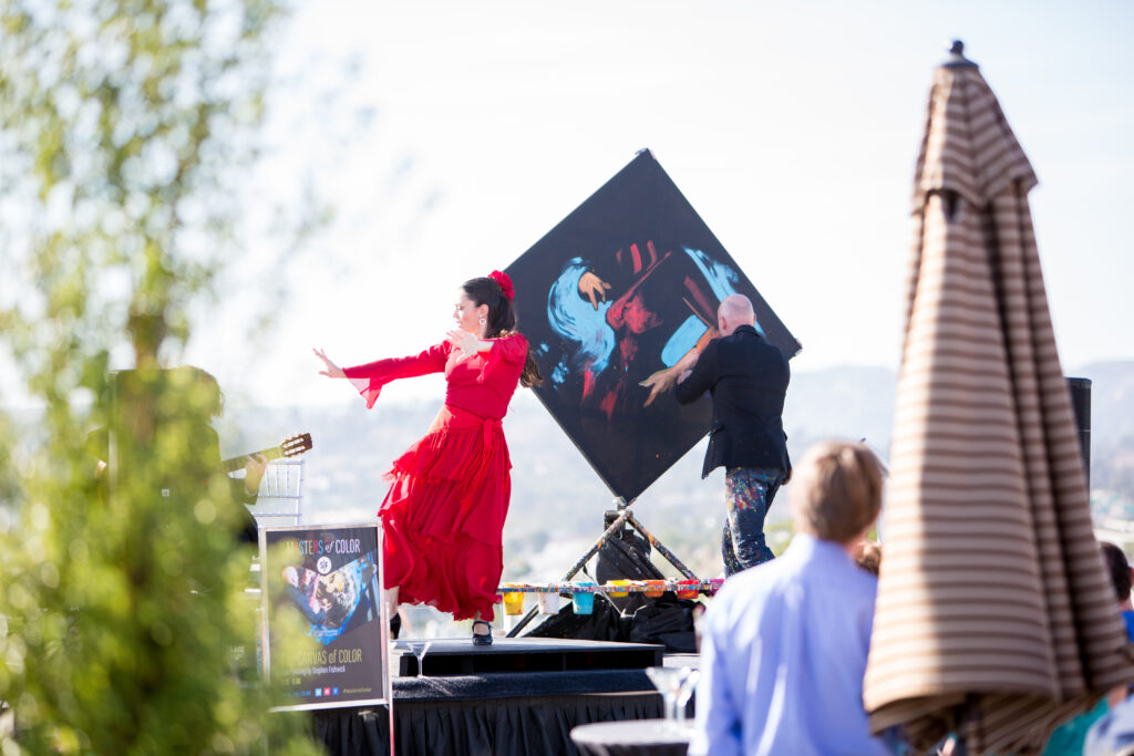 Masters Of Color: 2014 doing a live painting and dance on stage for an engaged crowd at The Centre Escondido